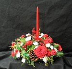 The Christmas Cardinal guards the nest as the snow falls in the forest. Can you hear the whistle?? Keepsake Cardinals , nest in the fragrant seasonal greenery, Pine, Fir, Cones and give you Mother Nature in your home. The arrangement is made up of red Carnations, red Carnations, red Roses, red glass balls, variegated Holly, hardy white Starburst, and Sharp Chrysanthemums,and Canadian Evergreens