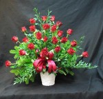 Red Freedom Eco roses and mixed foliage. Express your love and sympathy.