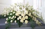 Resplendent with roses, Tulips, orchids, and lilies, this spray is an elegant and sophisticated display.
