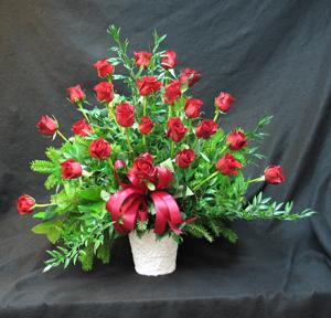 Red Freedom Eco roses and mixed foliage. Express your love and sympathy.