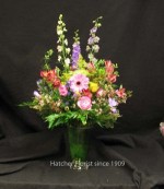 A lovely vase of mixed flowers with some Larkspur from California. Have your Mother's Day flowers delivered a day or two before the Sunday.