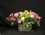 To honour your Mother an arrangement named after the " Royals " the Cambridge. Keepsake ceramic in slate or honey filled with flowers form the english garden. Roses,ranunculs,statice ,wax flower, spray roses, eryngium, carnations, solidago and dianthus.