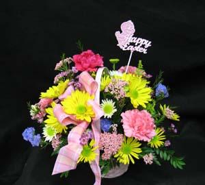 Whicker basket with a Spring mix of colours and long lasting blooms. Hatcher original.