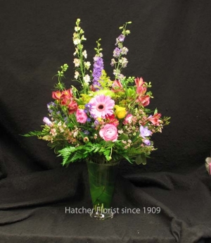 A lovely vase of mixed flowers with some Larkspur from California. Have your Mother's Day flowers delivered a day or two before the Sunday.