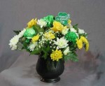 A green, yellow, and white arrangement for St. Patrick's Day. This centre piece will, make any " laddie, or colleen " proud. Our late grandfather, Robert Kyle was Irish.