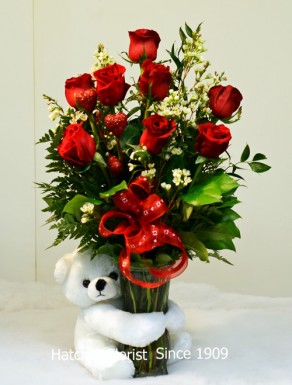 Valentine Cupid bear white 9 in or 20 cm. 12 Freedom or Classy roses from Ecuador with wax flower bow and heart. in a vase ready to go. Valentine Cupid bear white 9 in or 20 cm   Valentine Day delivery available fresh from our flower shop.